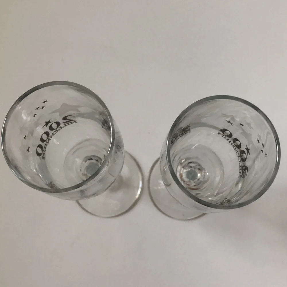 2 vintage Champagne Glasses 2000 Millennium Clear Silver Stars & Letters 8.75”